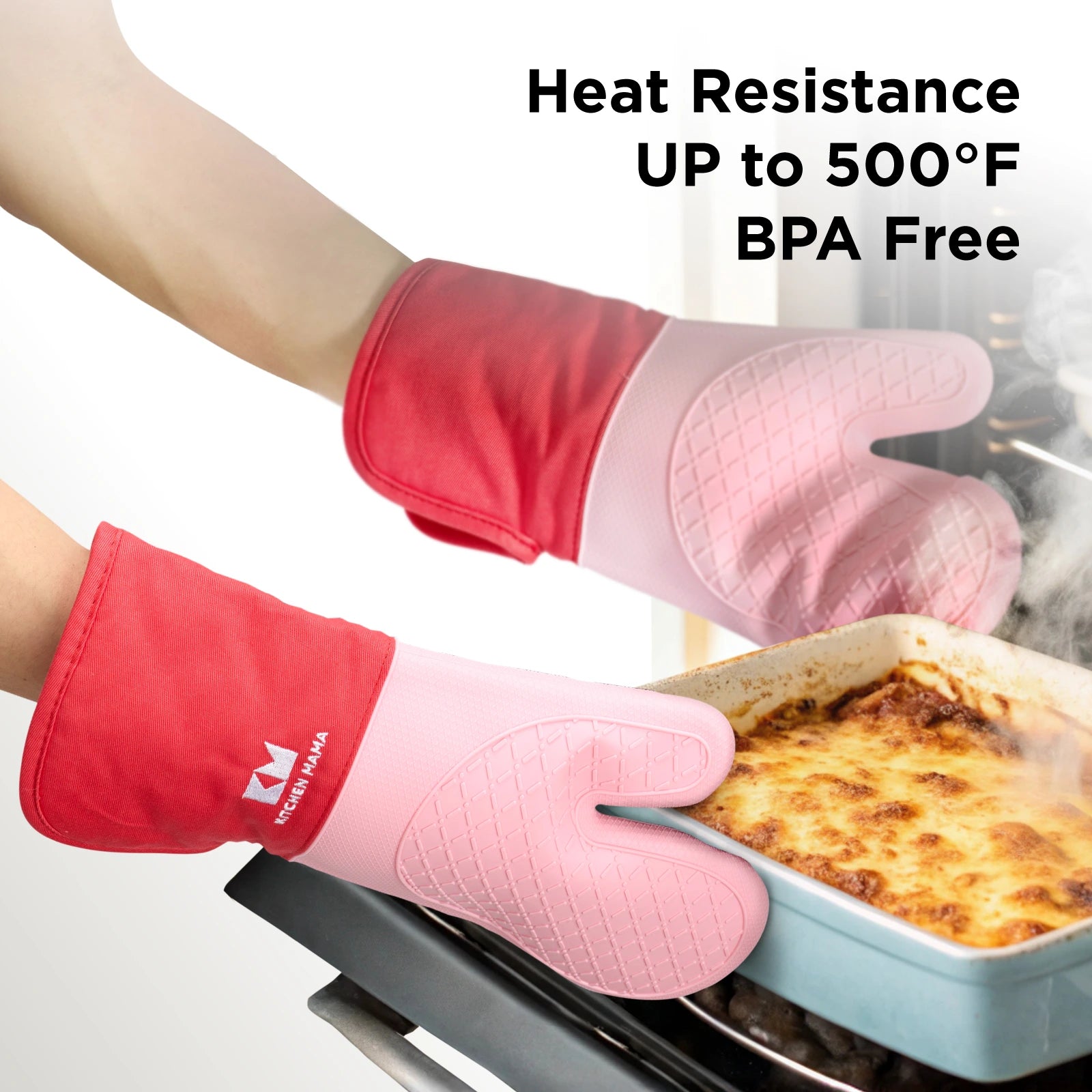 Hands wearing red and pink Shopkitchenmama silicone oven mitts, safely removing a hot lasagna dish from the oven with visible steam. Text overlay reads "Heat Resistance UP to 500°F, BPA Free."